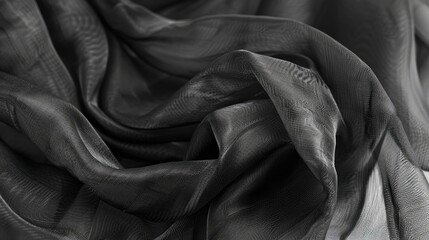 Obraz premium Soft, flowing abstract background of black fabric, delicate texture, artistic fabric concept.