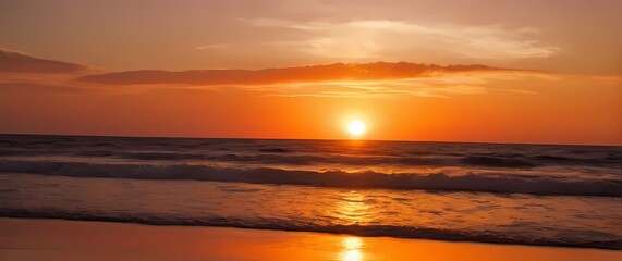 Fototapeta premium A vibrant beach sunset casting warm colors across the horizon inviting soulful reflection