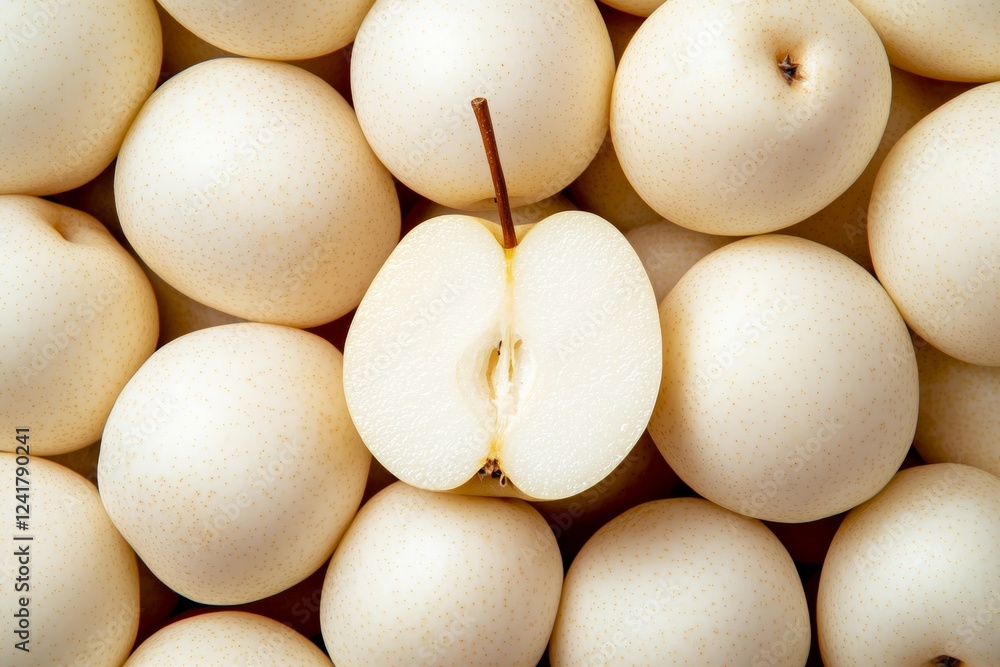 Poster close up of a bunch of apples with one of them cut in half