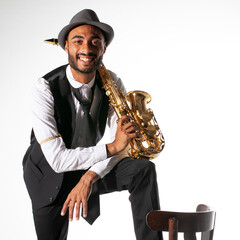 Smiling saxophonist on white background