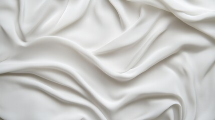 Obraz premium Smooth, Creamy White Fabric Texture: A captivating abstract background image featuring a luxurious white fabric, draped in soft, fluid folds, inviting you to feel its delicate texture.