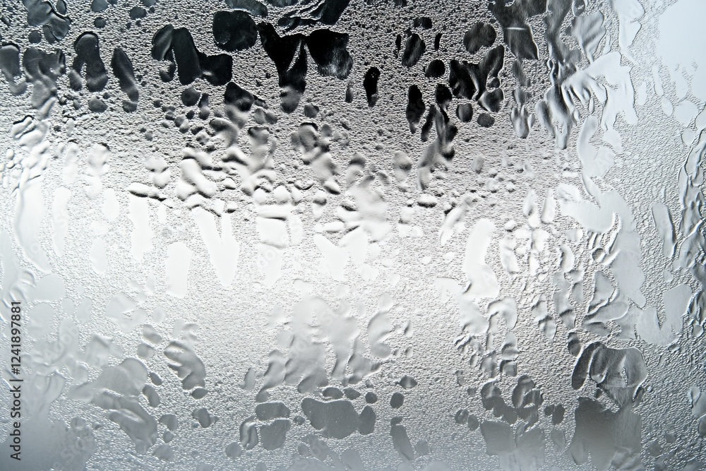 Poster misty glass creating abstract patterns with droplets and condensation in a moody indoor setting