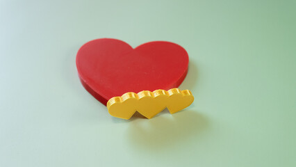Red heart with letters that say love, love and friendship day, February 14, Valentine's Day