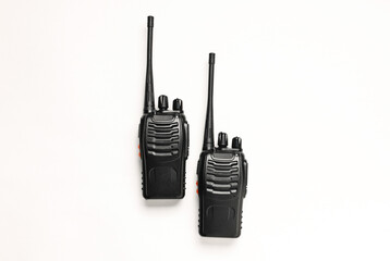 Walkie talkies on white background, top view