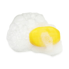 Yellow soap with foam on white background, top view
