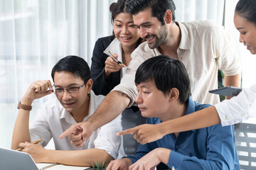 Group of diverse office worker employee working together on strategic business marketing planning in corporate office room. Positive teamwork in business workplace concept. Prudent