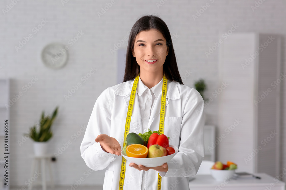 Sticker Female nutritionist with healthy food in office