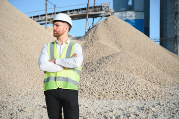 An engineer at a crushed stone or gravel plant. Stone mining