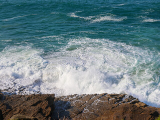 waves crashing on the rocks