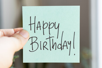 Sticky Notes with 'Happy Birthday' on Colored Paper