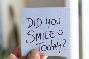 Sticky Notes with 'Did You Smile Today?' on Colored Paper