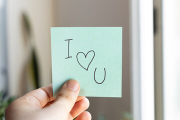 Sticky Notes with 'I ❤️ U' on Colored Paper