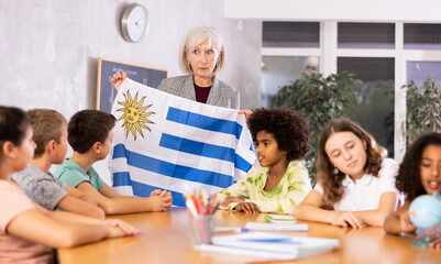 Kids learning together about uruguay in geography class
