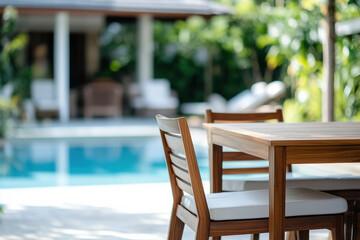 Poolside dining area with modern wooden furniture