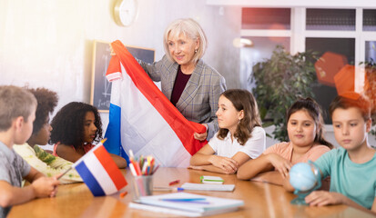 Kids learning together about netherlands in geography class