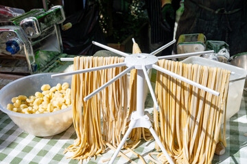 Italian food, fresh homemade pasta tagliatelle ready to cook on Portobello road food market, London