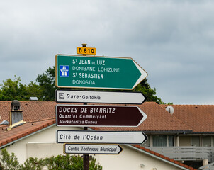 Obraz premium Road signs and directions, driving car in summer on French road, tourists destinations French cities and villages, different types or roads in France, transportation and traffic problems