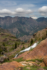 USA, Utah. Quartzite rock and waterfall, Twin Peaks Wilderness, Big Cottonwood Canyon, Wasatch Mountains