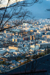 Naklejka premium a view of the sunset over Kyoto, Japan