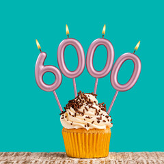 Candle number 6000 - Number of followers or likes.