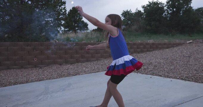 4th of July Child Girl Playing With Sparkler