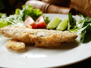 Fried pindang covered with egg 
