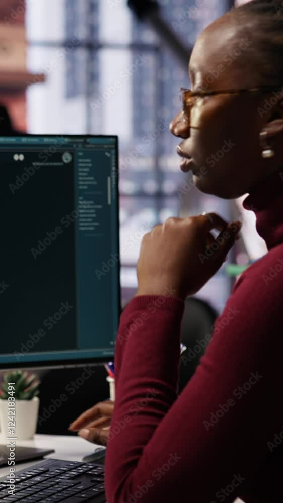 Aufkleber vertical video it technician in startup office using large language model to get help with coding pr