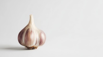 Garlic Bulb: A close-up studio shot showcases a single, fresh garlic bulb, its papery skin displaying subtle textures and colors, suggesting culinary versatility and health benefits. 