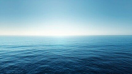 Obraz premium Calm blue ocean with a clear horizon and serene sky