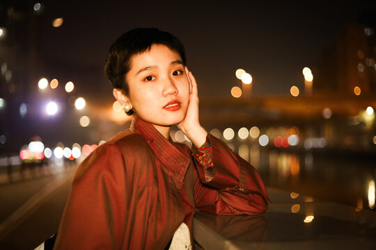 Woman Under City Night Glow