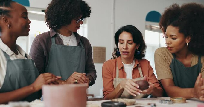 Pottery, learning and art teacher with people in workshop for skills with clay, ceramic and sculpture class. Creative, studio and woman with group to practice hobby, craft and pattern to mold object