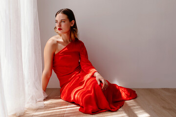 Gorgeous woman in red dress