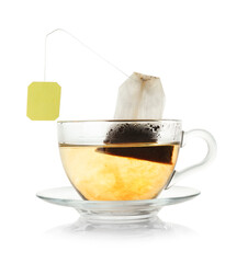 Brewing aromatic tea. Cup with teabag isolated on white