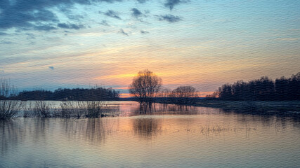 Calm lake with a tree in the foreground