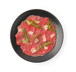 Fresh beef carpaccio with arugula and cheese isolated on white, top view