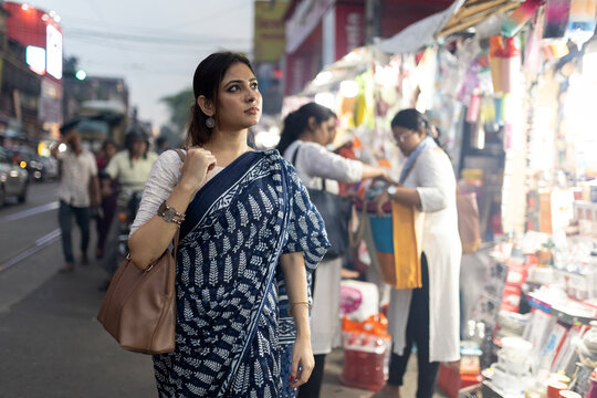 Indian woman roaming in the street market