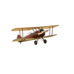 vintage brown biplane flying in a clear sky