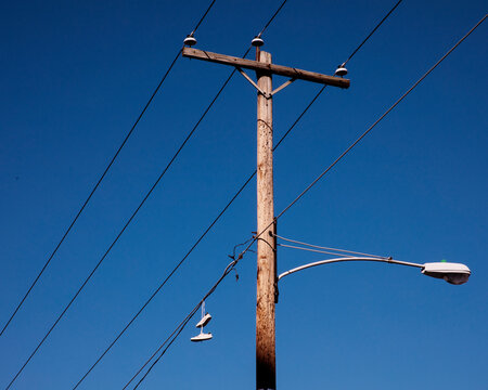 White sneakers hanging from telephone wire in Philadelphia, PA
