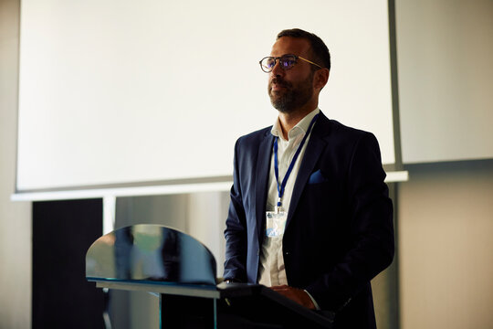 Businessman speaks at a conference