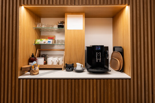 Modern coffee station illuminating coworking office breakroom