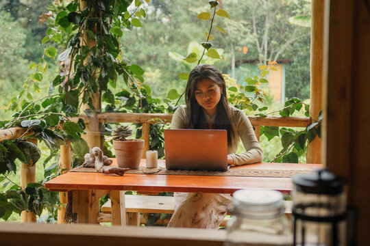 Woman telework with his laptop in nature