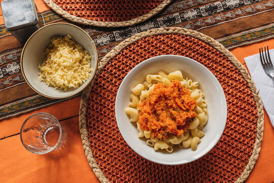 Pasta with Tomato sauce and parmesan cheese. Vegetarian Lunch.