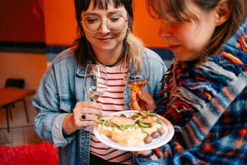 Friends Enjoying Wine and Appetizers