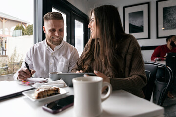 Business: Couple Working Together On Design Project