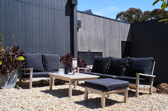 Outdoor seating area with modern design and natural elements