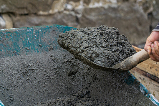 Concret in a wheelbarrow.