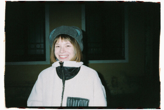 Portait of positive smille model look at the camera 