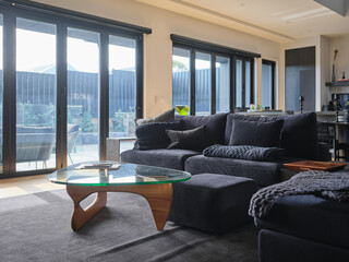 Modern living room with stylish furniture and natural light