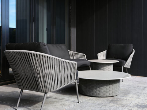 Chic outdoor lounge with stylish furniture and calm vibes