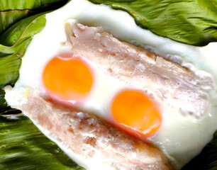 Steaming fermented pork and eggs in banana leaves, Thai northern food.